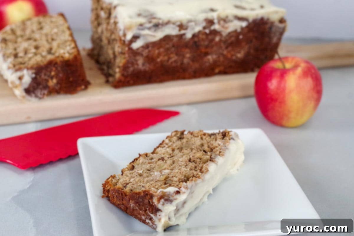 a slice of apple bread on a white plate with a