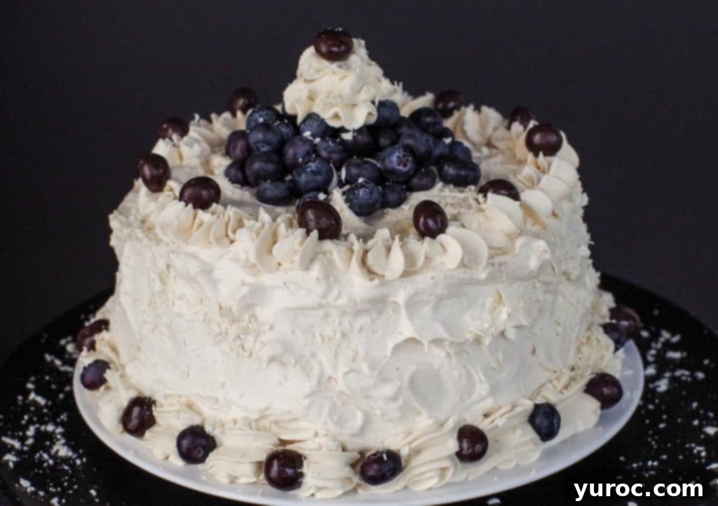 whole coffee flavored cake on a black platter
