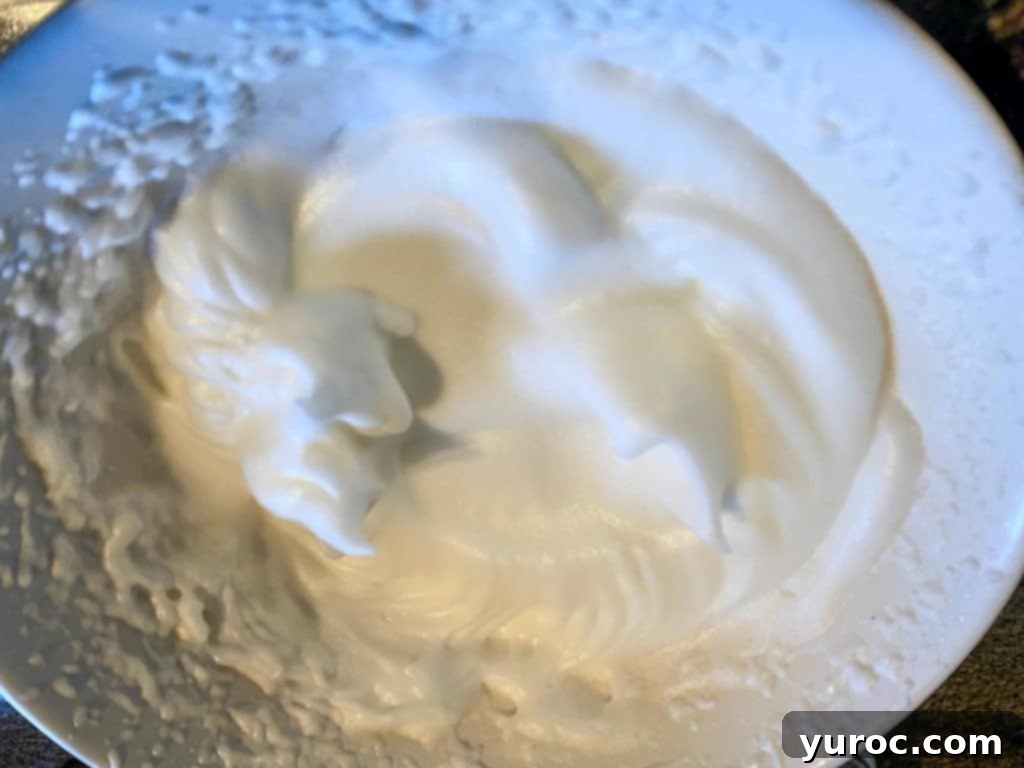 egg whites beaten to stiff in a bowl