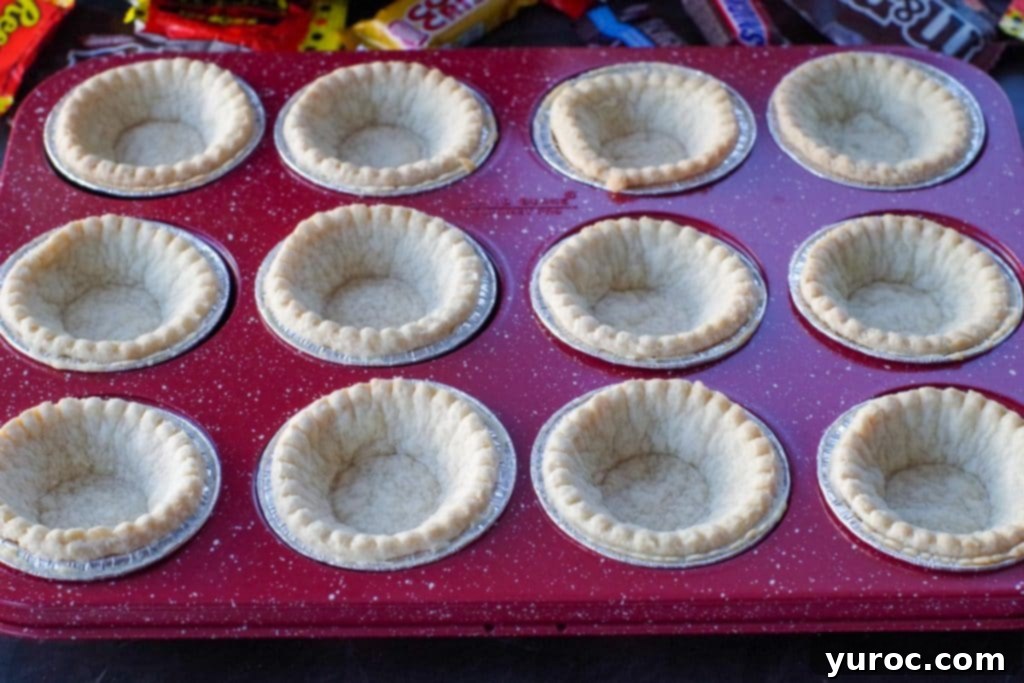 Halloween Candy Remix Tarts 5 Blind baked tarts shells in muffin tin