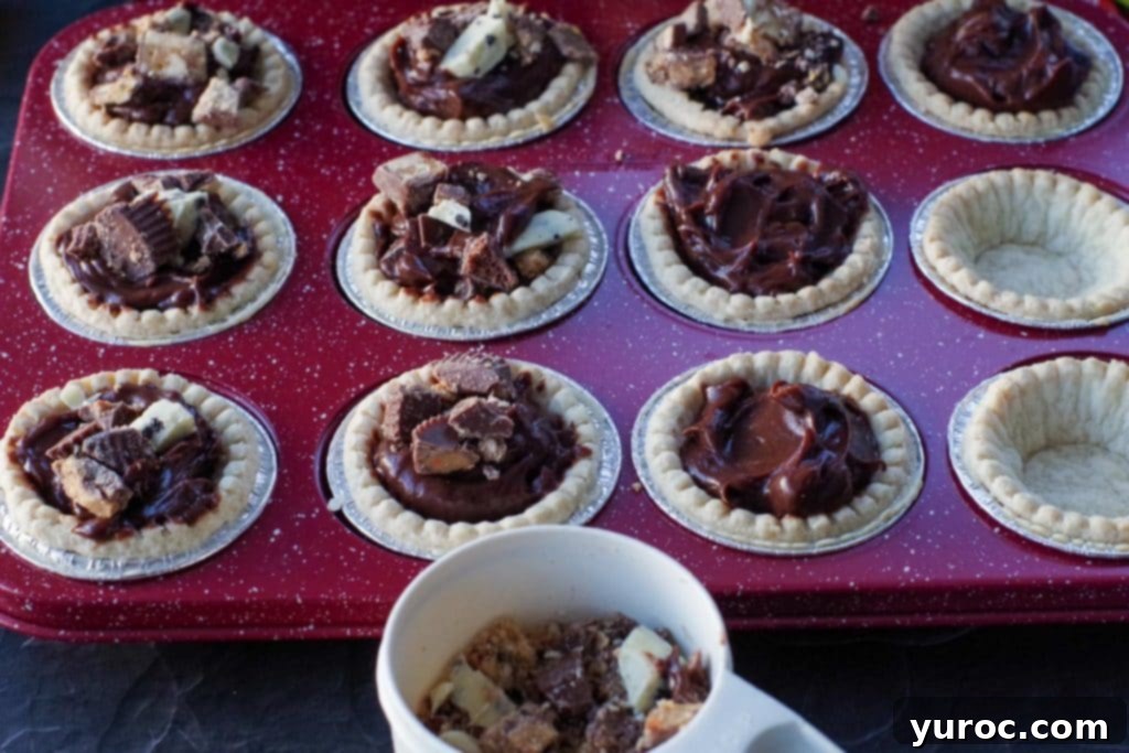 Halloween Candy Remix Tarts 6 tarts being filled with chocolate pudding and chocolates