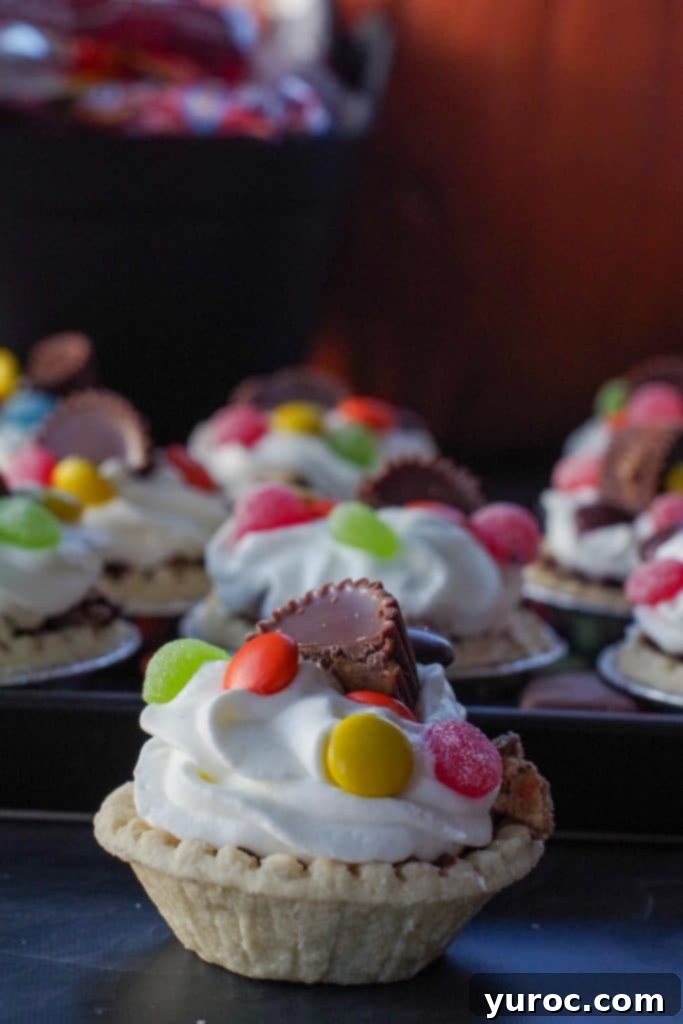 Halloween Candy Remix Tarts 10 one leftover candy tart sitting in front of a tray of tarts