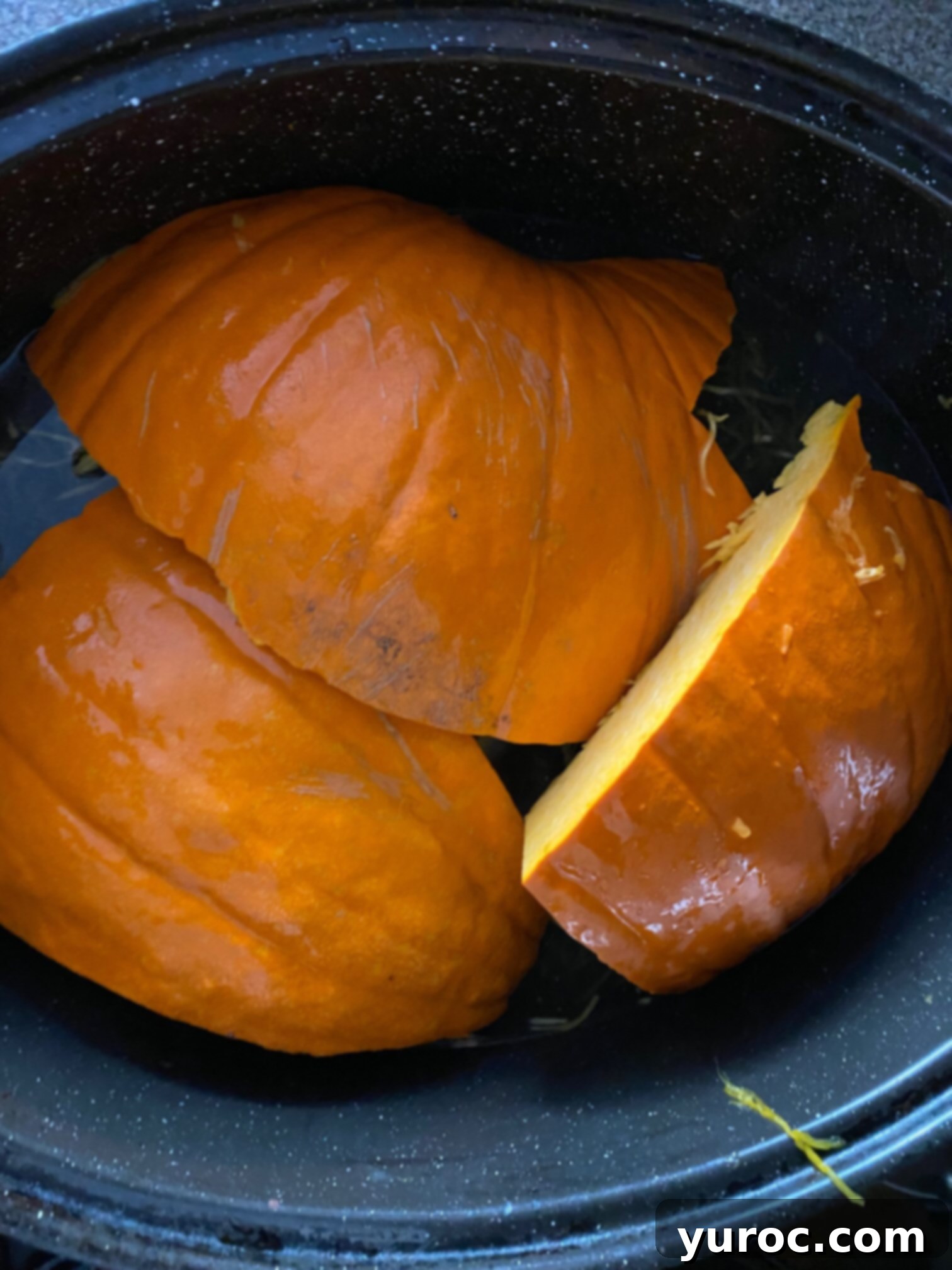 Unlock the Secrets of Whole Pumpkin Cooking and Homemade Purée 10 pumpkin cut into wedges in roaster