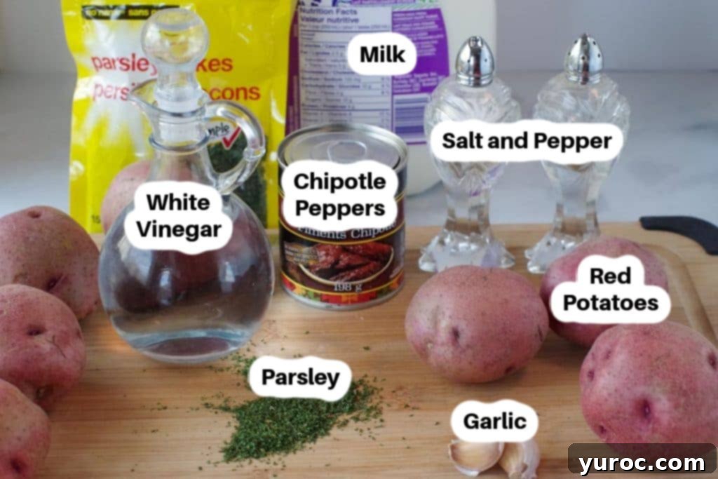 Ingredients in Chipotle mashed potatoes on a cutting board, labelled.