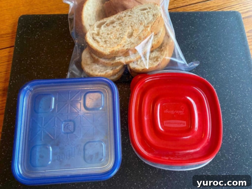 Raspberry Cream-Filled French Toast Sandwich 6 2 containers with french toast ingredients and a bag of slice French bread
