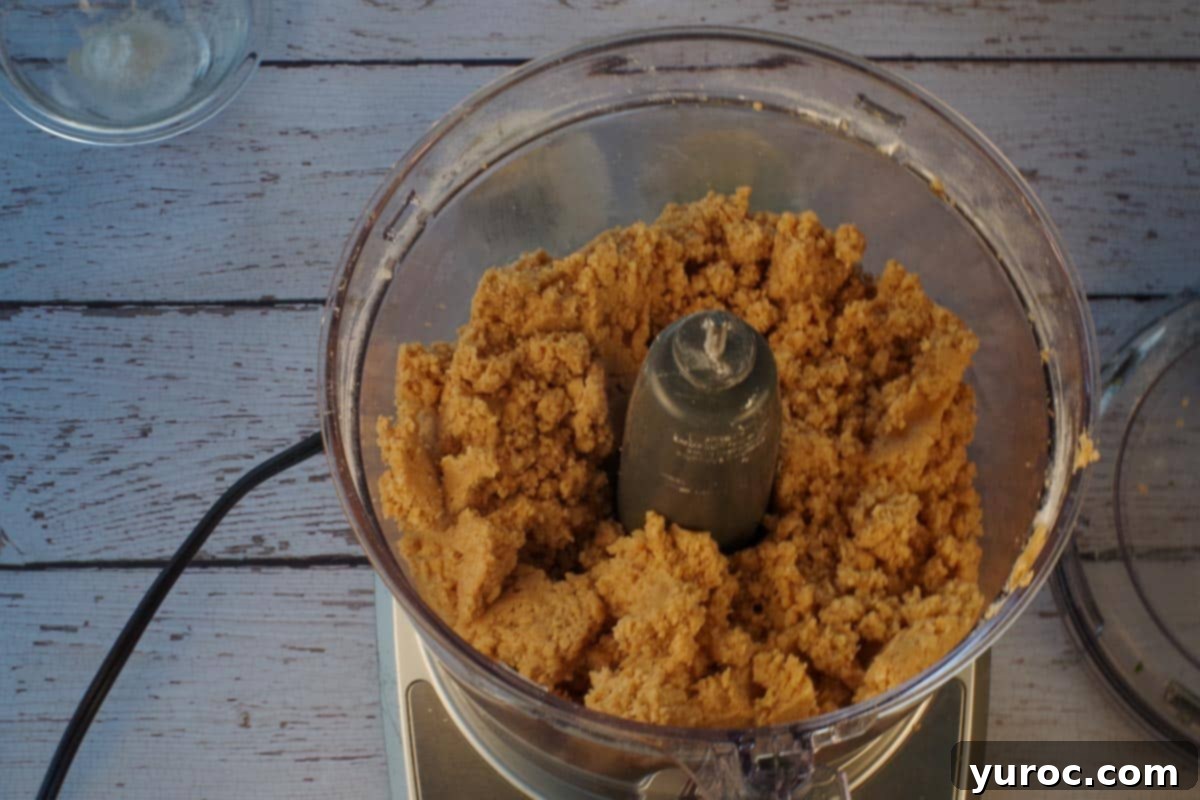 Base ingredients mixed together in the bowl of a food processor.