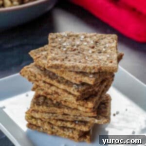 Golden Stuffing Crisps 8 Crispy leftover stuffing crackers stacked on a white plate