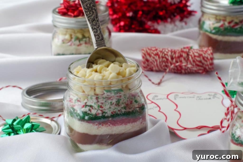 hot cocoa mix in a jar with a scoop in it