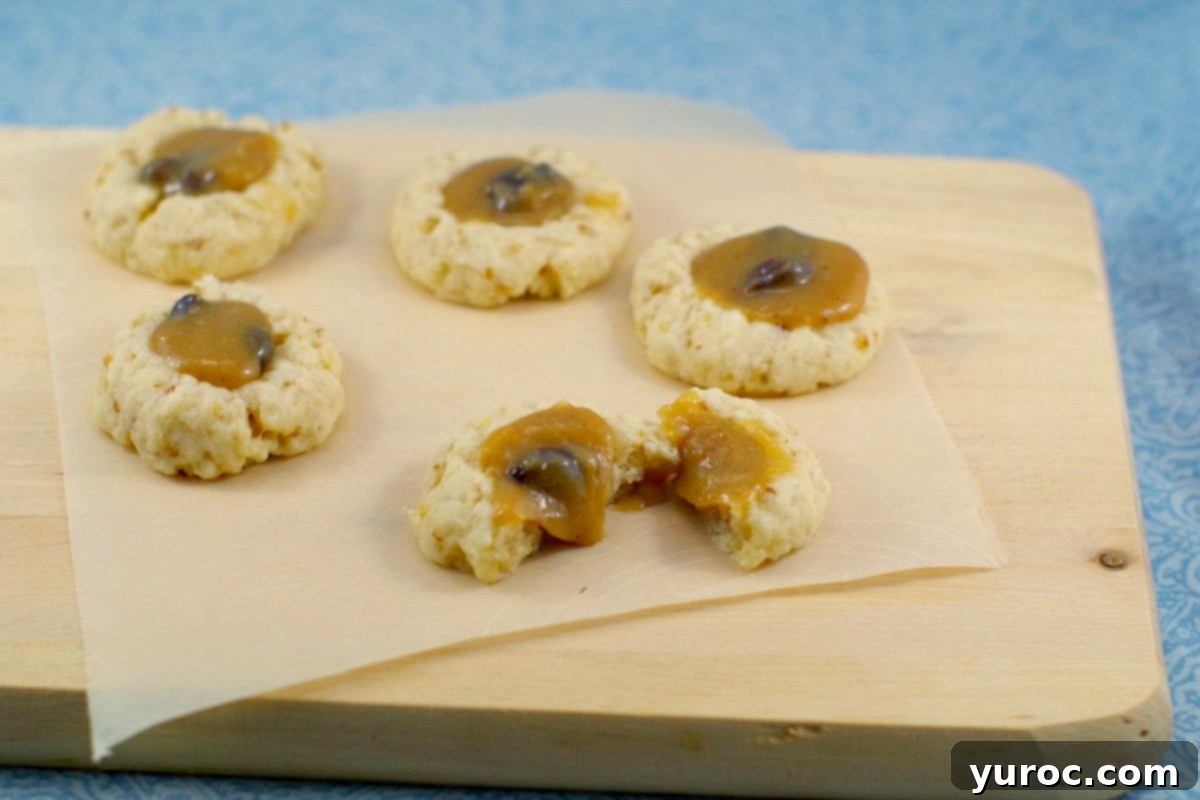 Butter Tart Thumbprint Delights 2 Butter Tart Cookies recipe |easy butter tart filling - Foodmeanderings.com