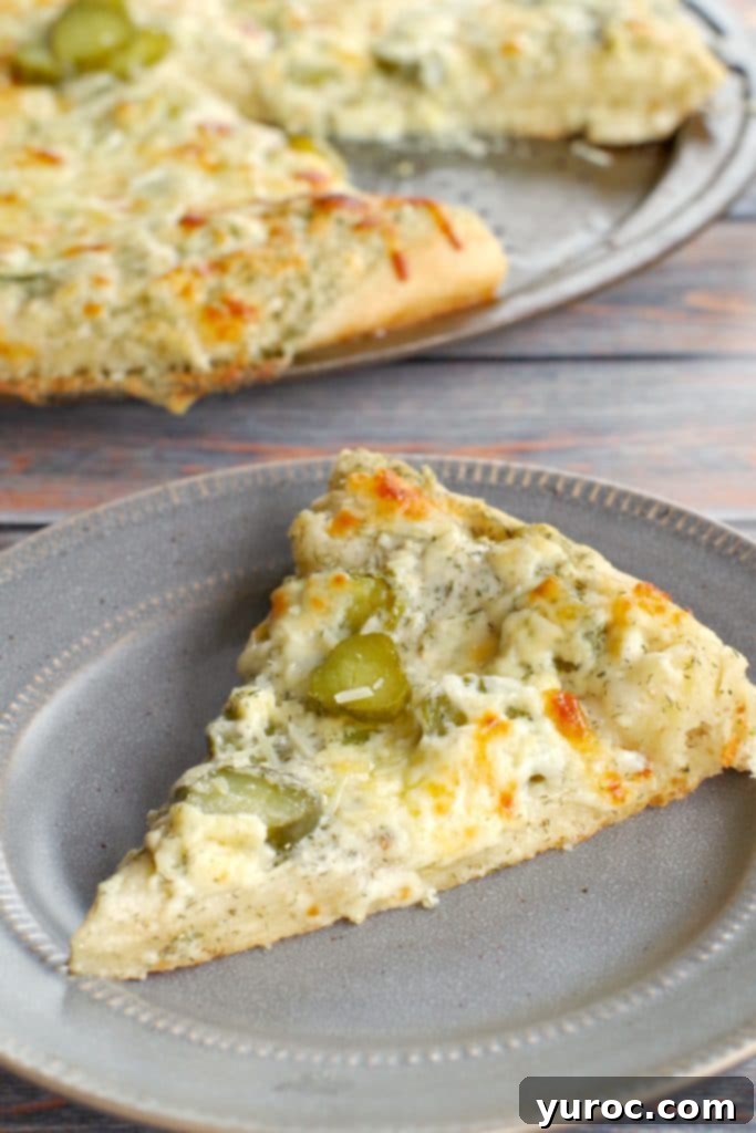 Şipşak 15 Dakika Pizza Hamuru 9 dill pickle pizza on grey plate with whole pizza in background