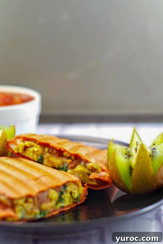 45 Effortless Tips for Boosting Your Produce Intake 6 breakfast burrito on a plate with kiwi flower ganish