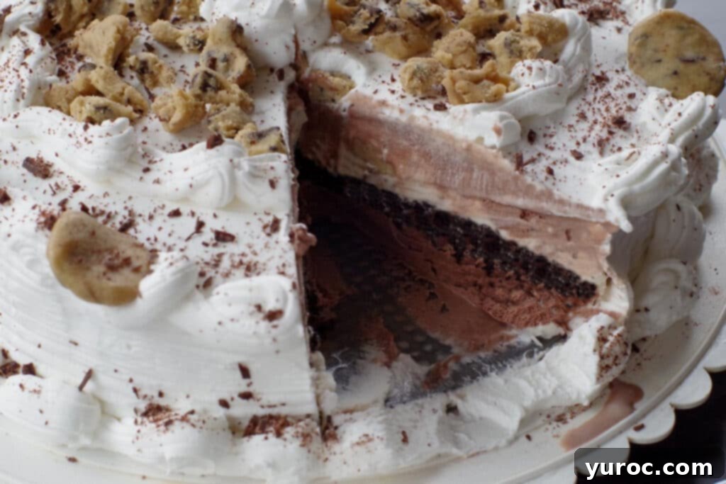 dairy queen cookie dough ice cream cake with a slice removed