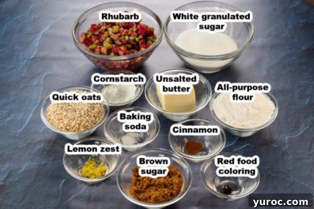 Various ingredients for rhubarb squares, including chopped rhubarb, oats, butter, flour, and sugar, neatly arranged in separate bowls on a wooden surface.