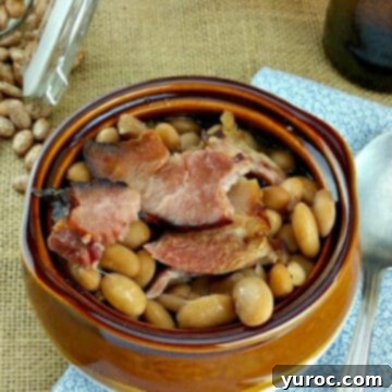 southern style ham and beans in a brown bowl