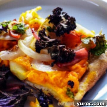 a slice of pumpkin pizza on a plate