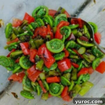 15 Creative Fiddlehead Dishes 13 all dressed fiddleheads in a glass bowl