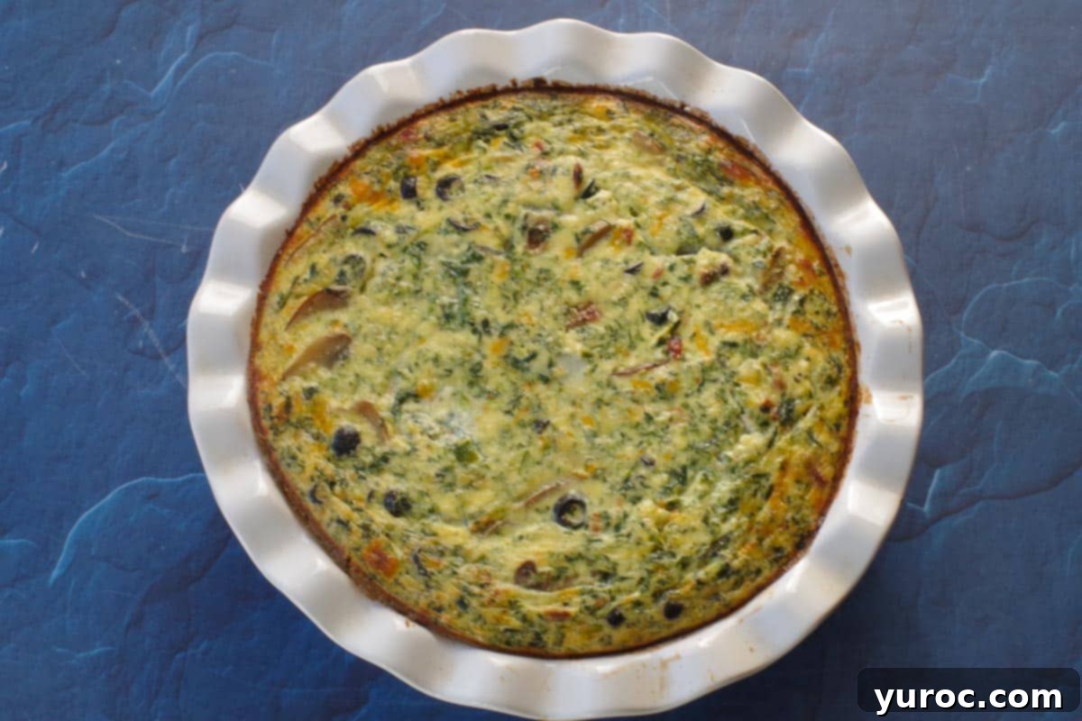 Mediterranean Slim Crustless Quiche 10 cooked quiche in pie pan