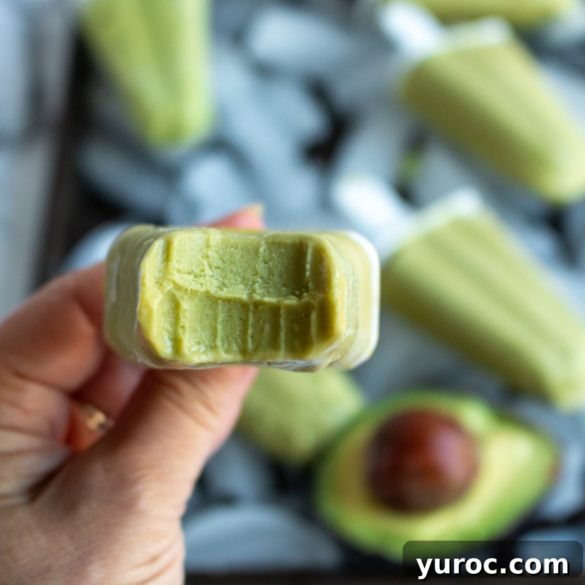 Smooth and creamy Avocado Ice Candy, highlighting its appealing green hue and refreshing texture.