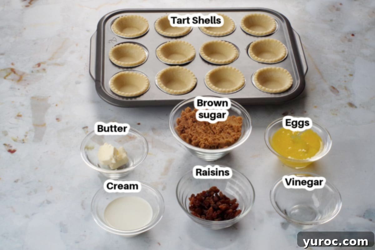 butter tart ingredients, in glass bowls, labelled (on granite counter surface)