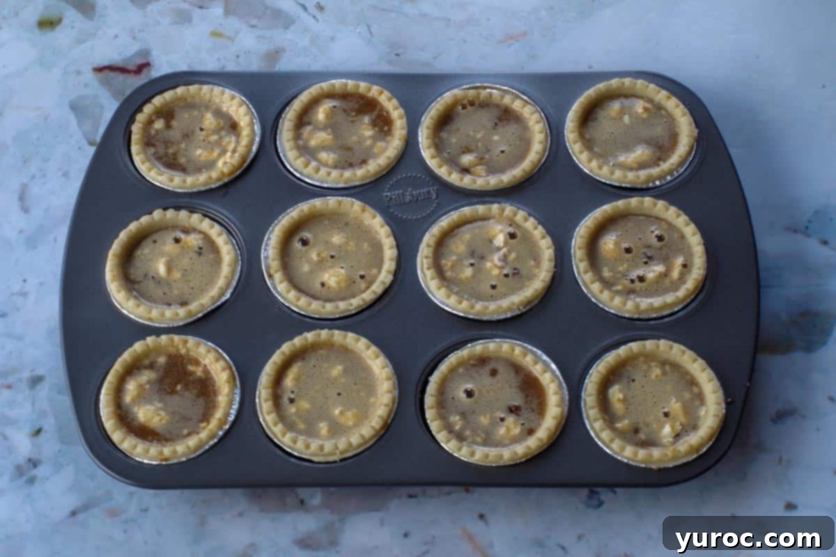 butter tart filling poured into tart shells until ¾ full