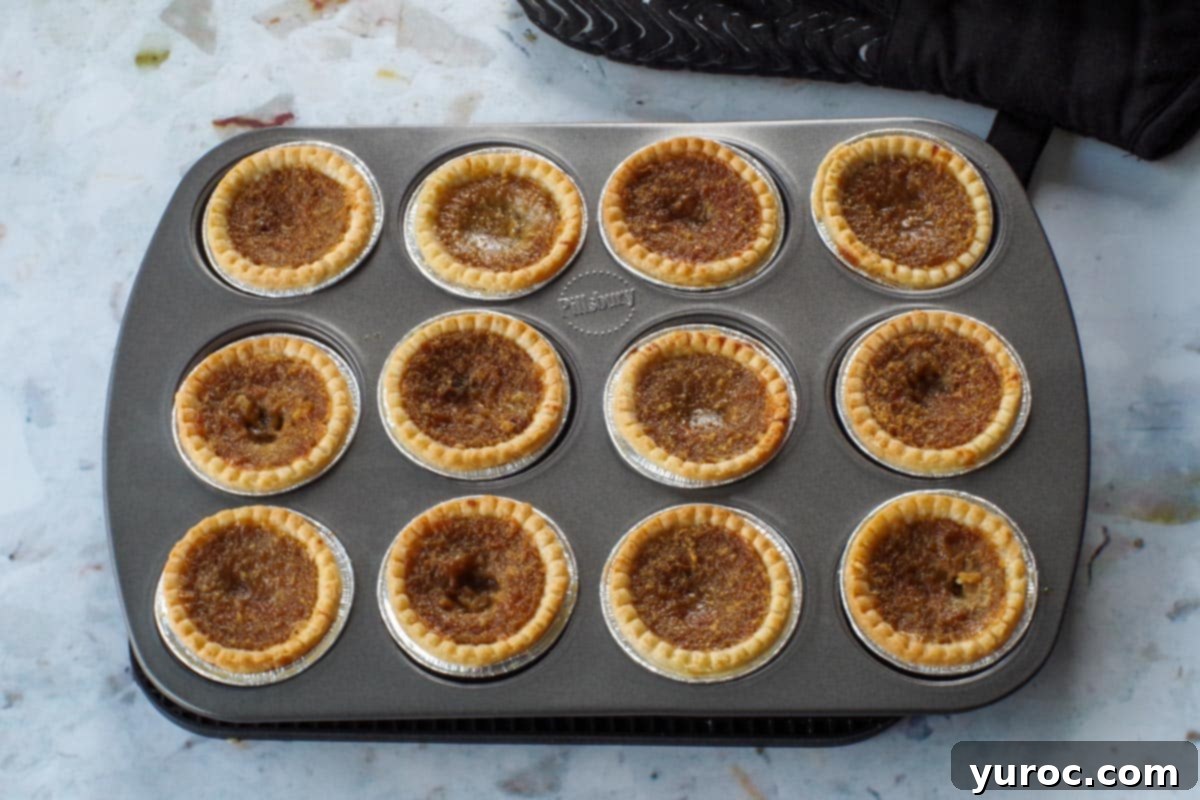 baked butter tarts in muffin tin