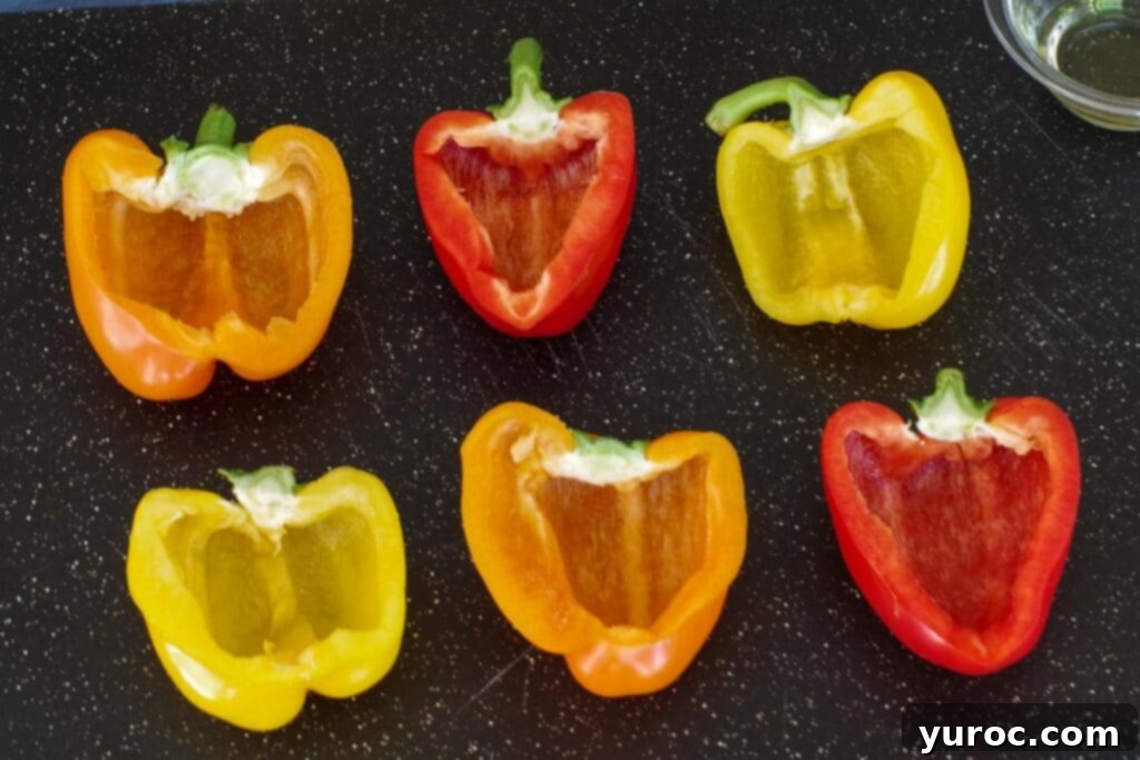 peppers sliced and cleaned on black cutting board