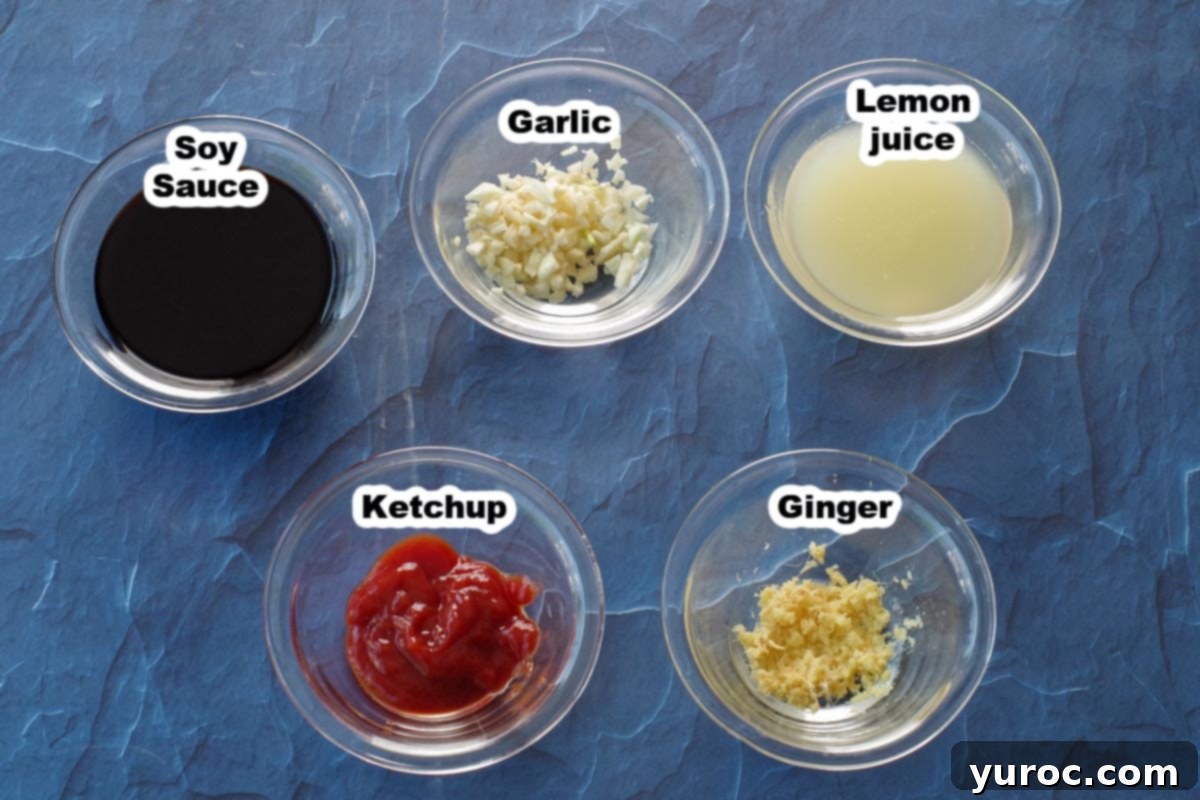 ingredients in soy ginger marinade, in glass bowls and labelled