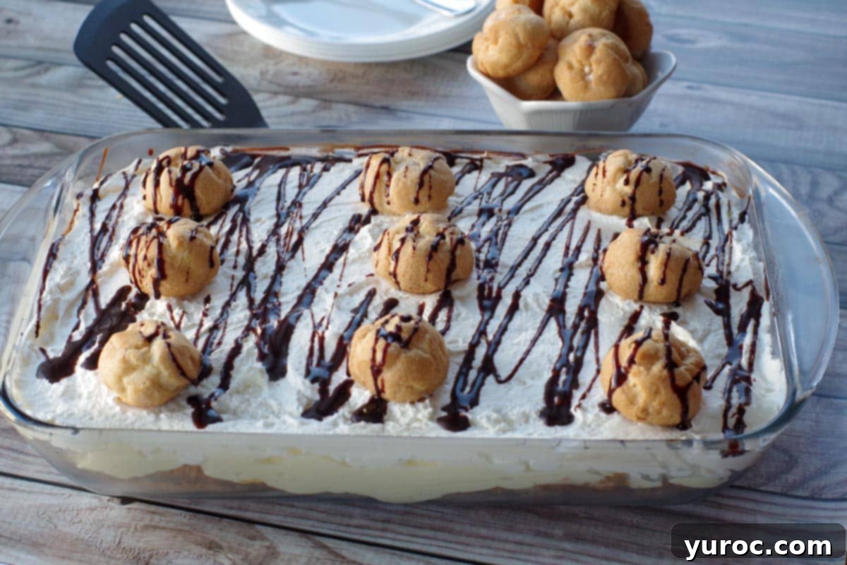 15 Easy No Bake Potluck Desserts 17 cream puff dessert in a glass dish with plates and a bowl of cream puffs in background