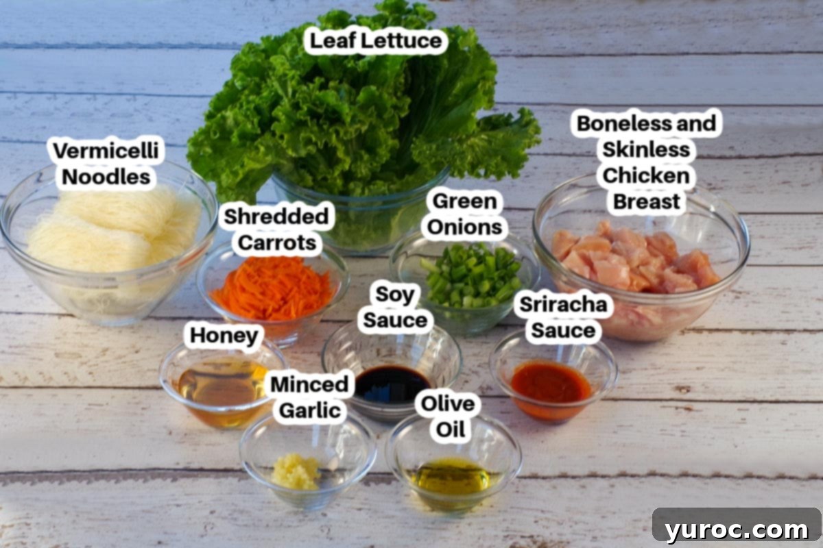 Honey Fire Chicken Lettuce Embrace 3 Ingredients needed for spicy sriracha lettuce wraps in glass bowls, labelled