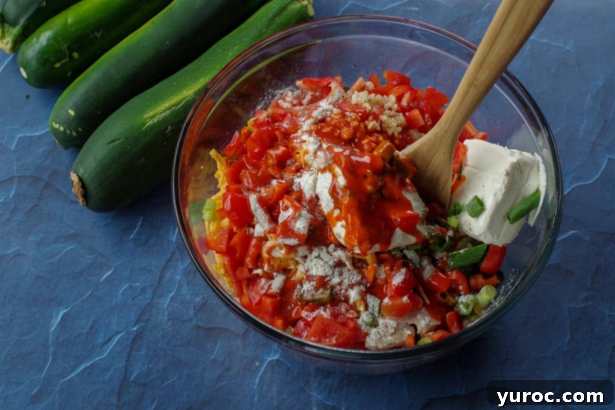 all ingredients mixed together in large bowl, except zucchini