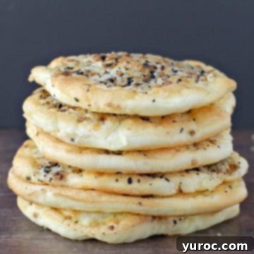 6 pieces of everything bagel cloud bread stacked on top of each other