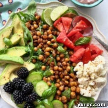roasted chickpea salad on a white plate