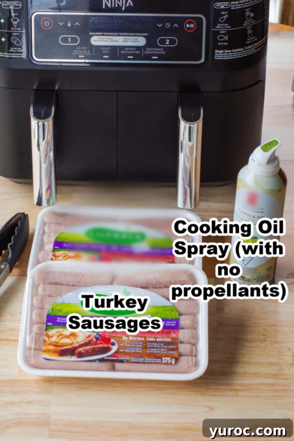 2 packages of turkey sausages and spray oil in front of an air fryer