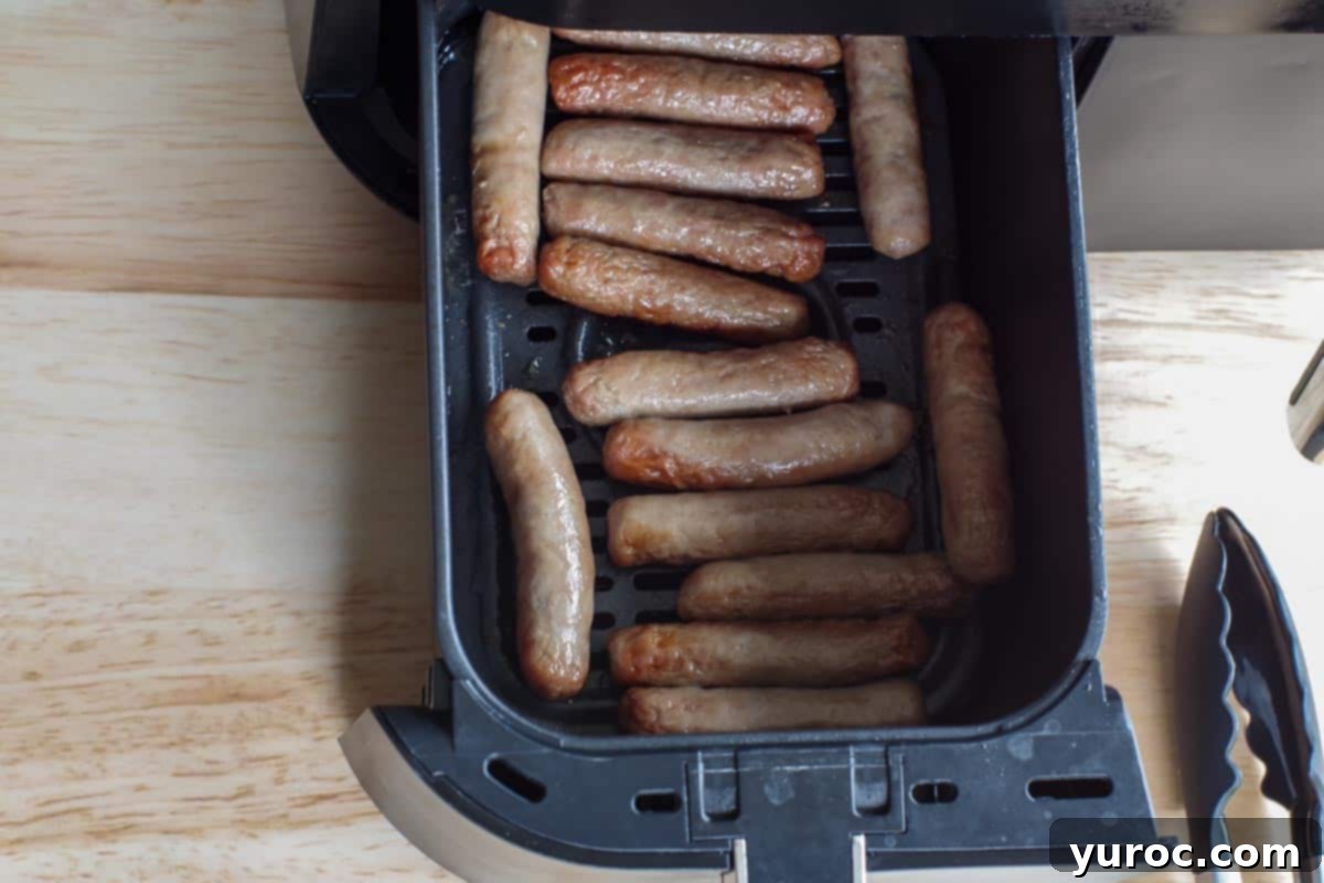 cooked turkey sausages in air fryer drawer