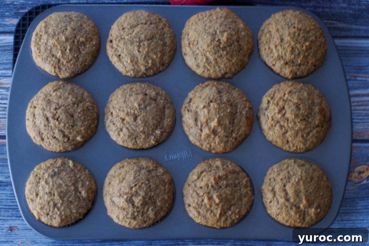 Baked Wheat Bran Muffins in a muffin tin.