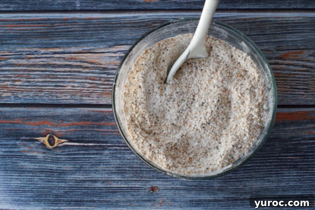 Dry ingredients mixed together in a medium glass bowl,