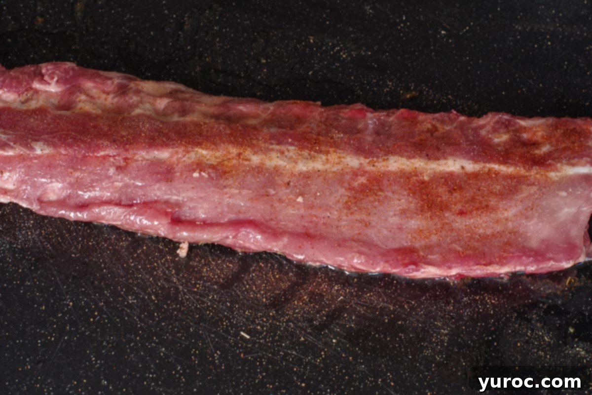 ribs flipped over with seasoning