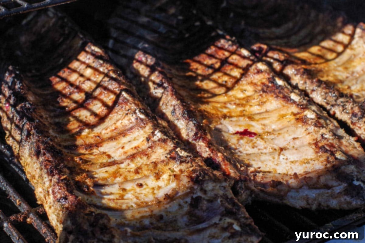 ribs flipped and grilled on BBQ