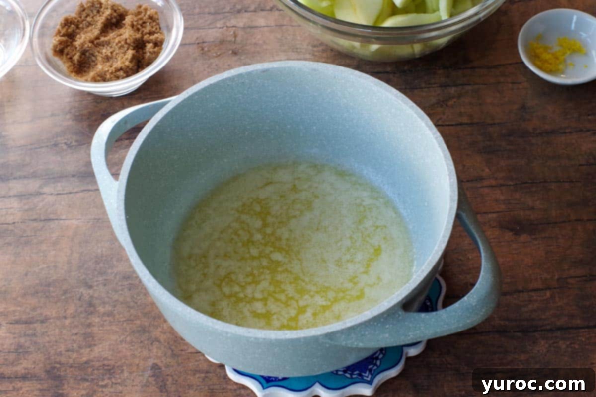 butter melted in light blue pot