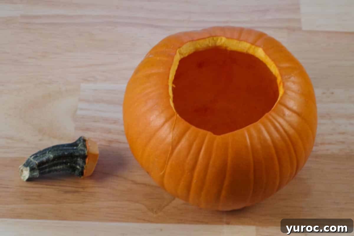 hollowed out pumpkin with trimmed stem.
