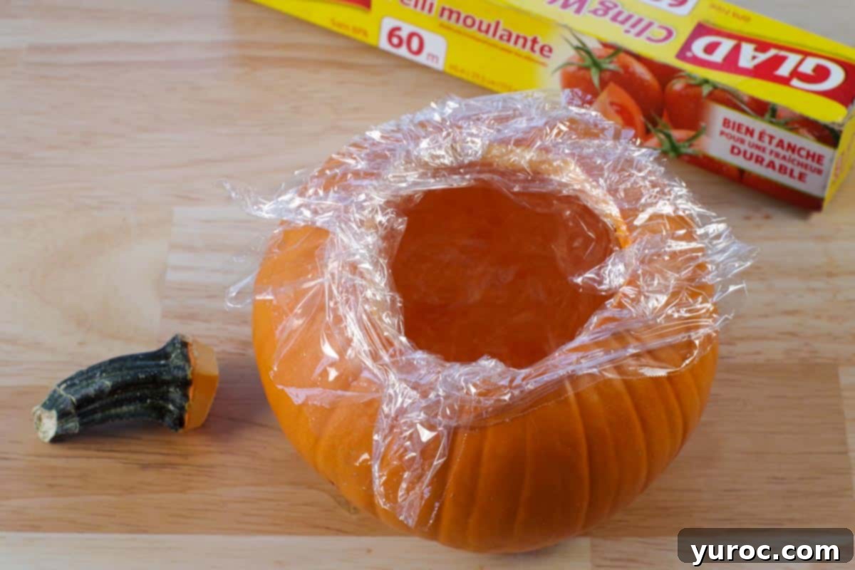 pumpkin lined with saran wrap