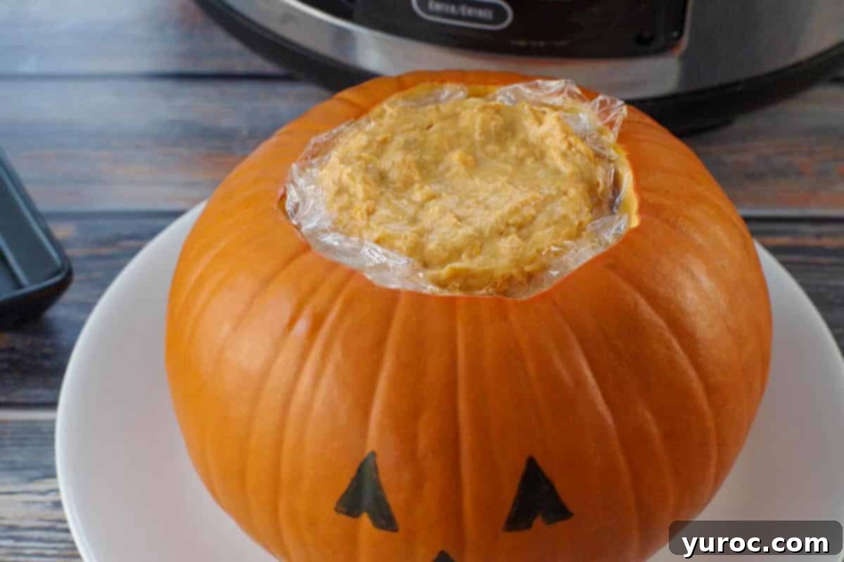 pumpkin filled with buffalo chicken dip