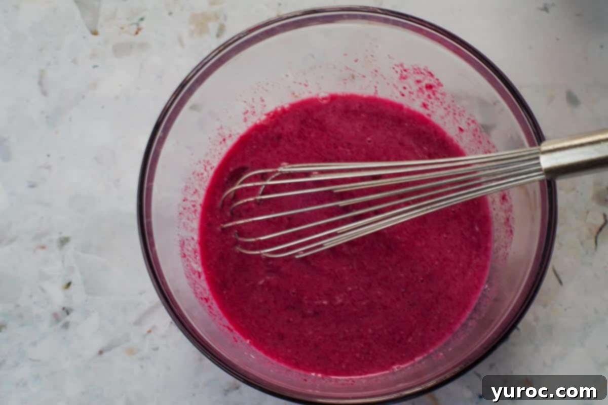 Healthy Red Velvet Pancakes with Luscious Chocolate Cream Cheese Butter 9 Wet ingredients including pureed beets whisked together in a large mixing bowl.