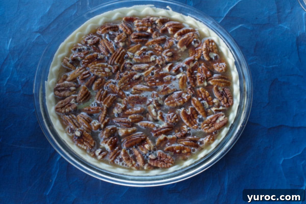 syrup/egg mixture poured over pecans in pie crust