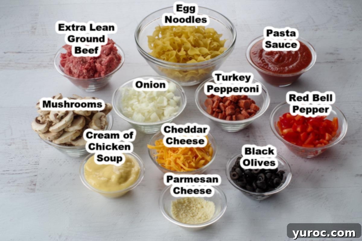 Guilt Free Pizza Casserole 2 pizza casserole ingredients in glass bowls, labelled