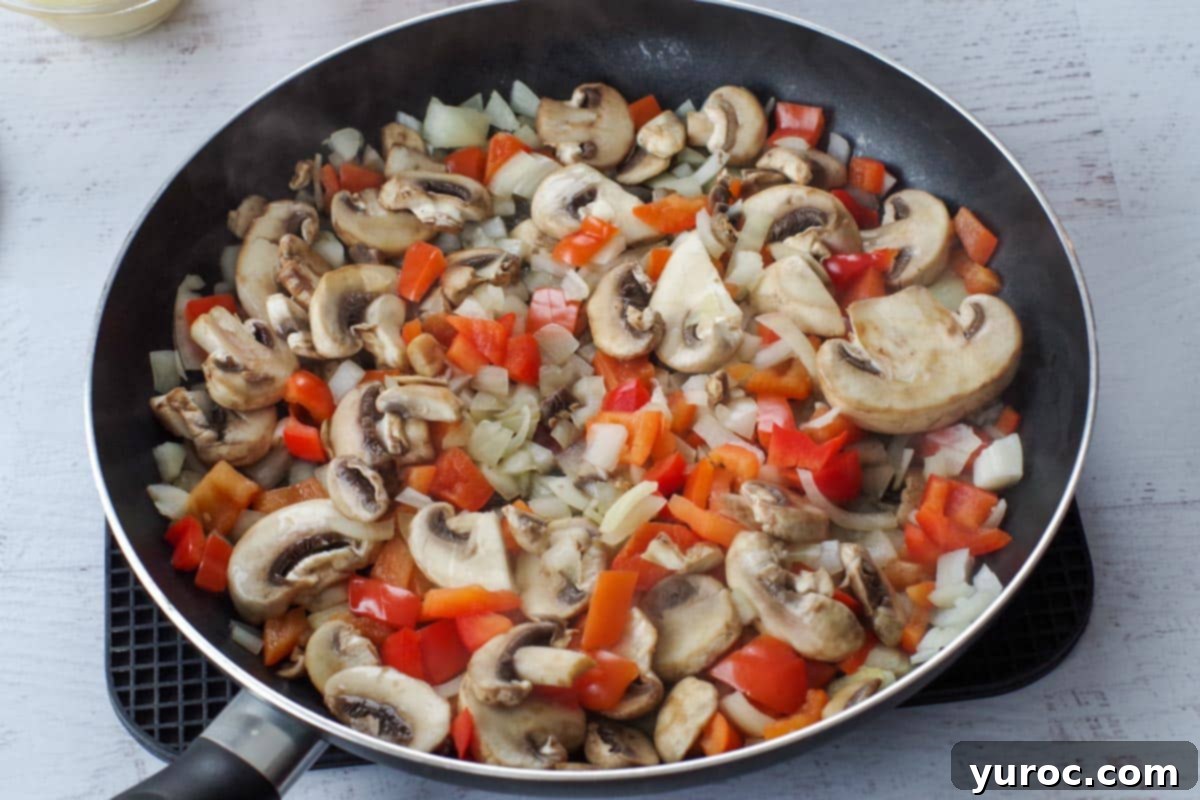 Guilt Free Pizza Casserole 3 Skillet with mushrooms, onions and peppers
