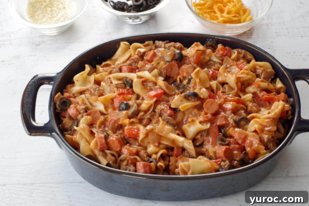 Guilt Free Pizza Casserole 7 Mixture placed in casserole dish