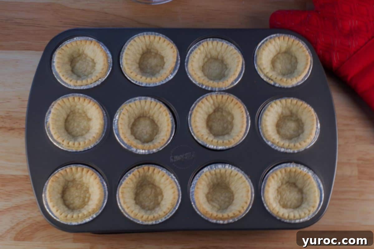 Baked Tiramisu Tarts in muffin tin.