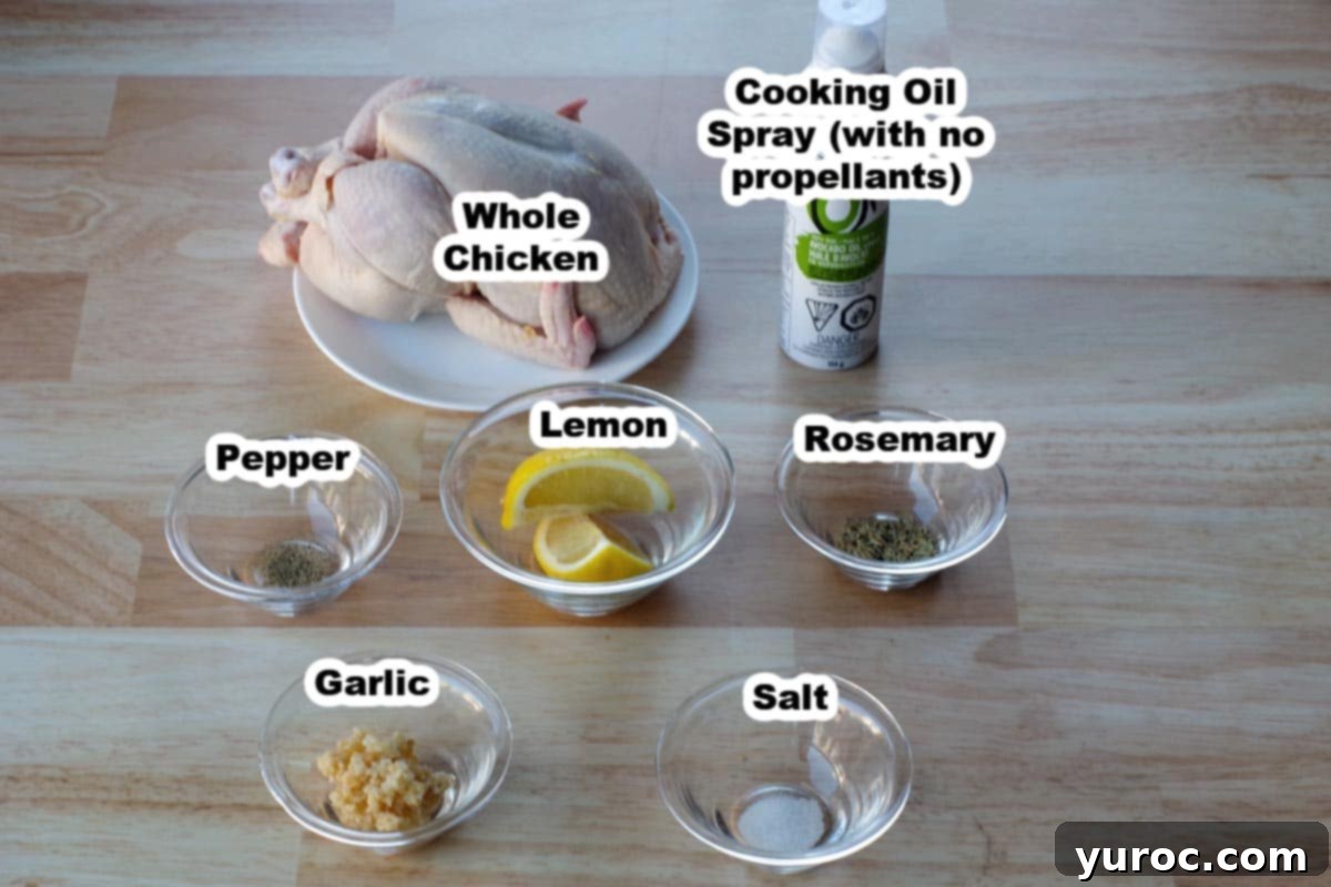 Ingredients for air fryer roasted chicken arranged in glass bowls on a faux wood surface.