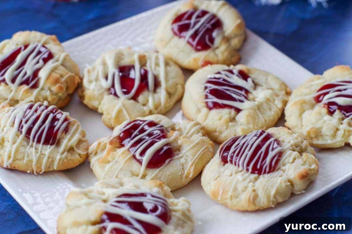 white chocolate raspberry cookies on a white plate